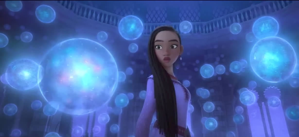 Bolle dei desideri fluttuano intorno ad Asha in Wish di Disney